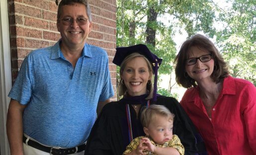 Jen with her child and parents