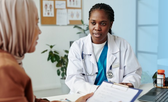 woman talking to healthcare provider about overactive bladder
