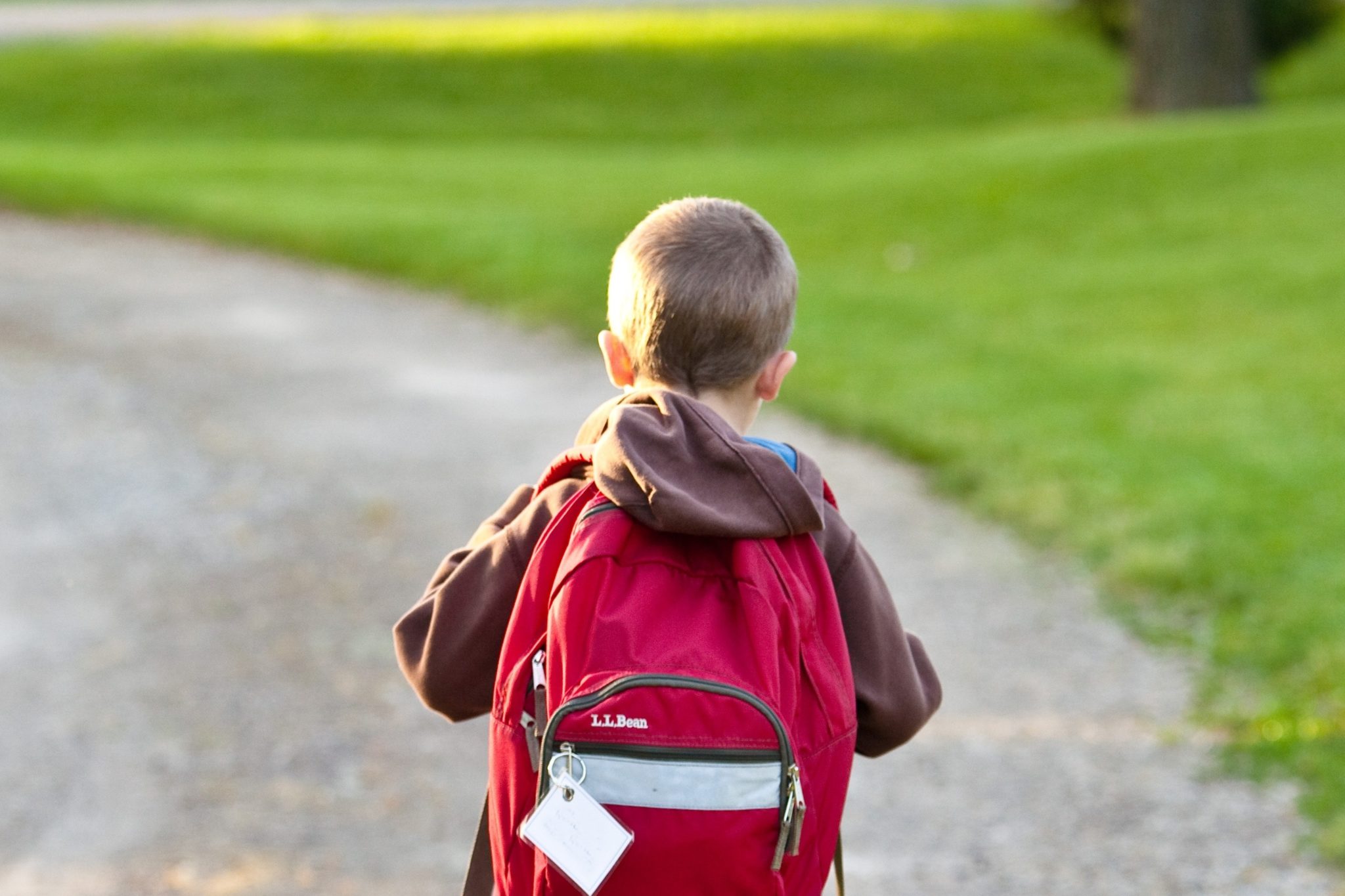 back to school with catheters in backpack
