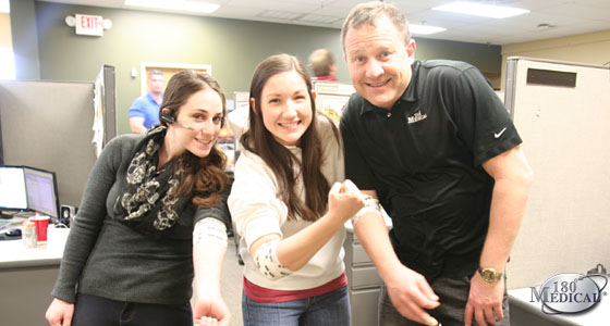 180 Medical employees Sara, Ashley, and Richard give blood