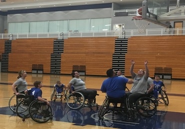 playing adaptive wheelchair basketball