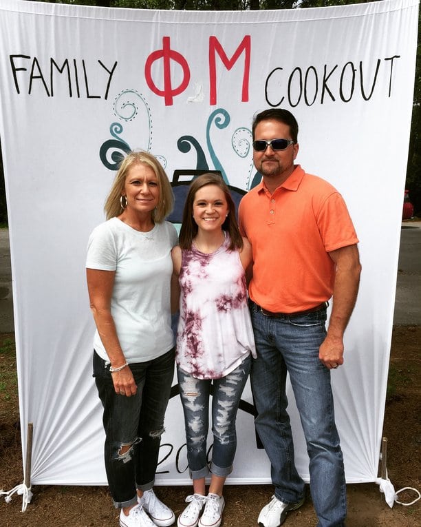 Tiffany Matthews with her parents