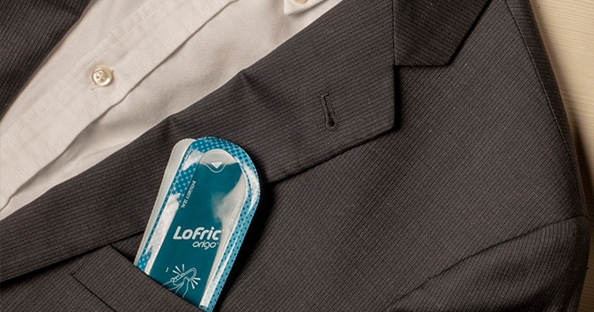 LoFric Origo catheter in mens suit jacket pocket
