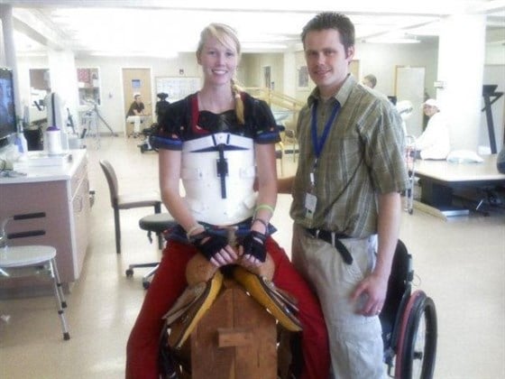 amberley snyder in saddle during rehab after sci