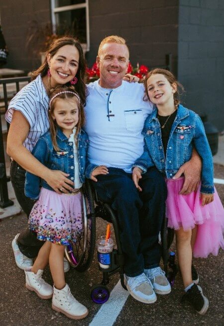 Brendan with his wife and children