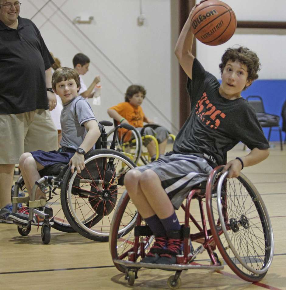 Aaron and Peter Berry discover wheelchair basketball