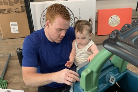 Brendan, an adult with spina bifida, and his daughter