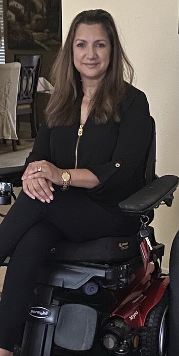 Meena in Permobil Wheelchair
