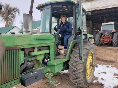 Michele driving a tractor