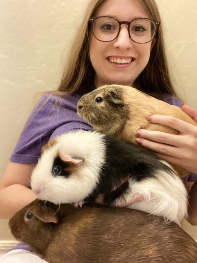 Jennifer with her guinea pigs