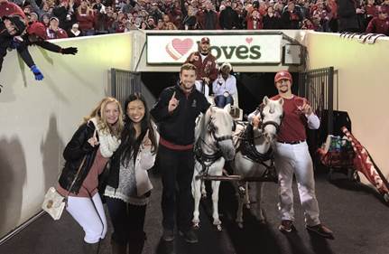 Lindsay with OU Sooners horses