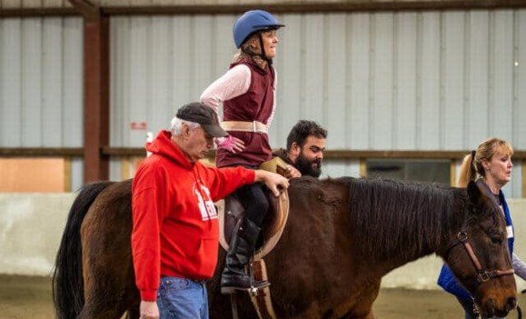 Julie's horseback riding rehab therapy after spinal stroke