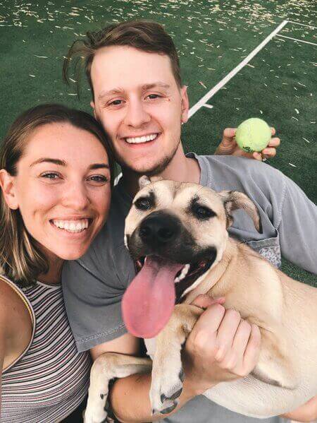Isaiah with wife and their dog