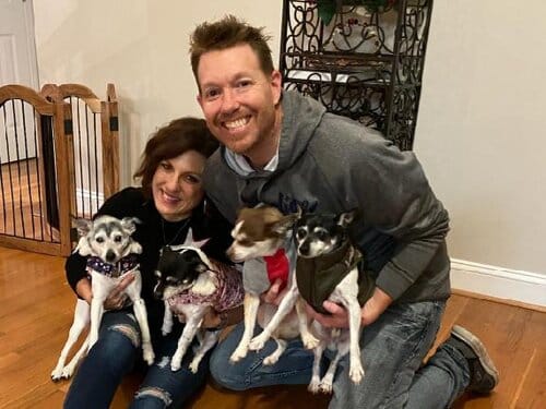 Jessica with her husband and their dogs