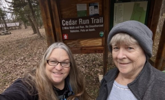 debra with her friend hiking with an ileostomy
