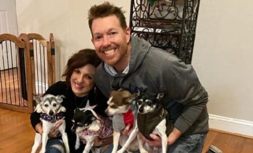 Jessica with her husband and dogs