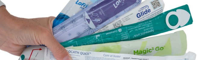 hand holding variety of catheter types and brands