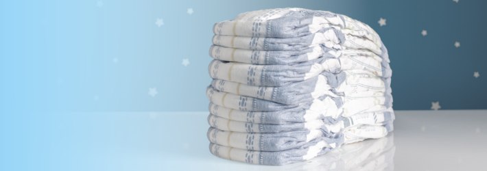 adult diaper incontinence supplies on table