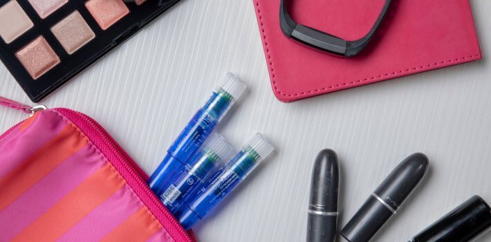 cure twist female prelubricated catheter in makeup bag